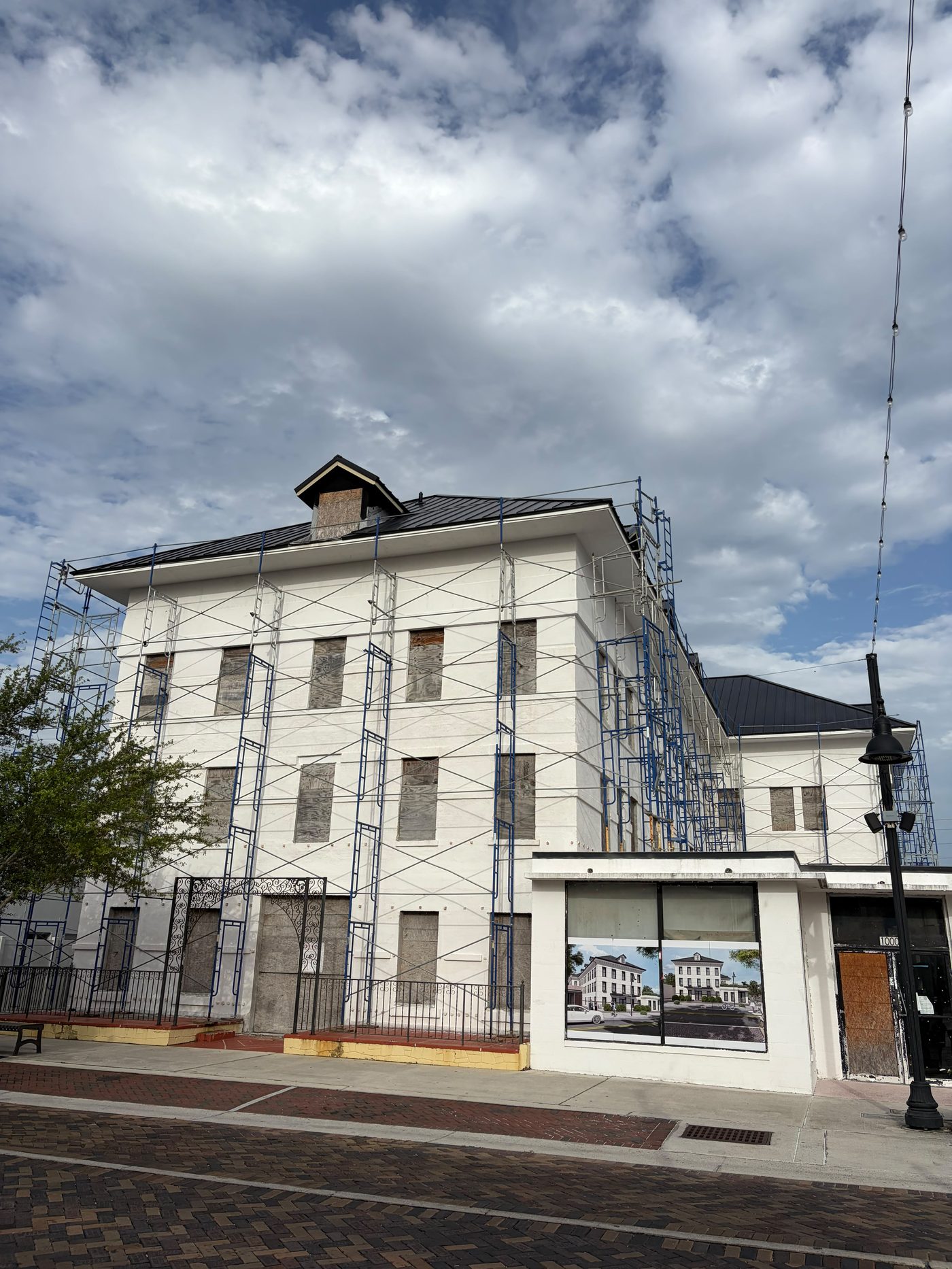 The hotel under restoration, scaffolding on the facade